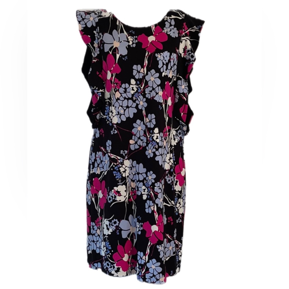 Sleeveless dress with ruffles around the arm holes.  New w/o tags.